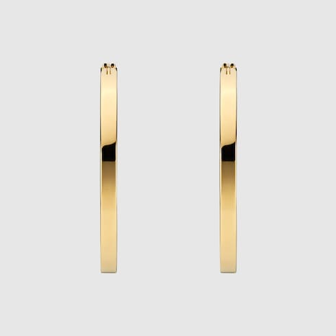 Серьги-кольца Gucci Blondie с вырезанным символом