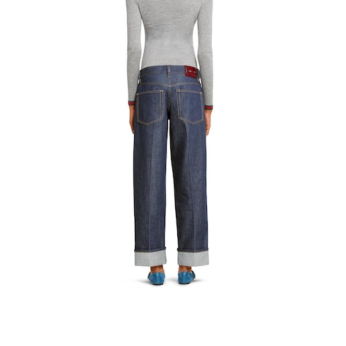 Pantaloni in denim con dettaglio Gucci cimosa