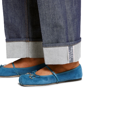 Pantaloni in denim con dettaglio Gucci cimosa