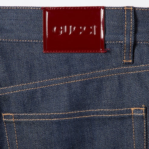 Pantaloni in denim con dettaglio Gucci cimosa