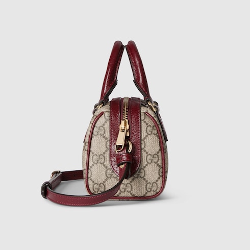 Ophidia mini boston bag