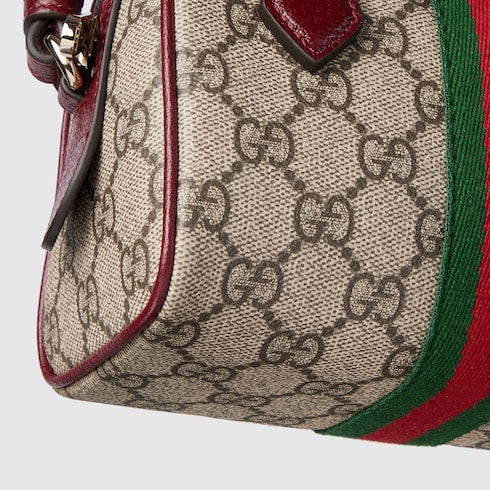Ophidia mini boston bag