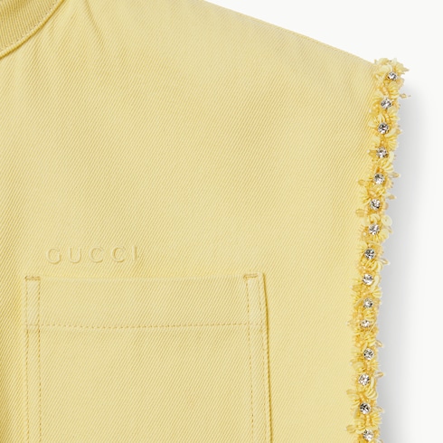 Top in denim con ricamo