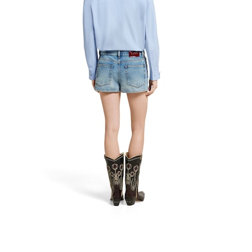 Shorts in denim con trattamento stone-washed