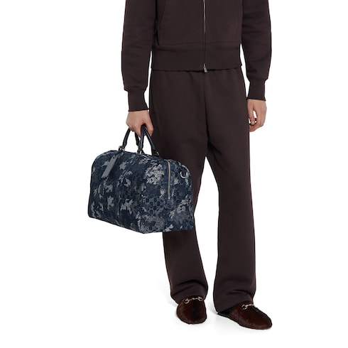 GG denim duffle bag