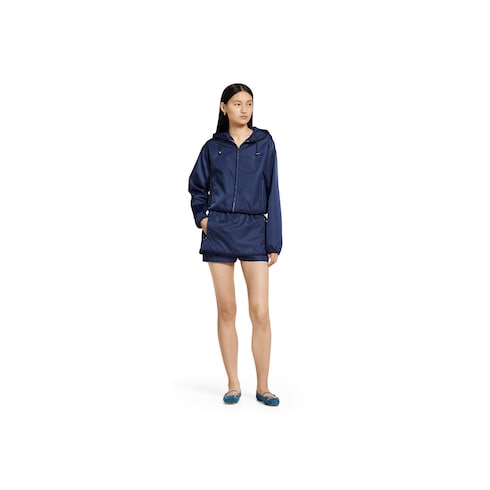 Jupe-short en gabardine de nylon avec logo en métal
