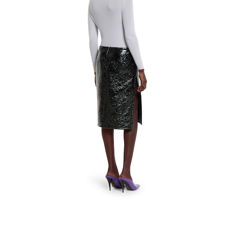 Shiny leather and neoprene skirt