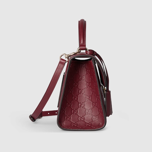 حقيبة Padlock متوسطة الحجم ذات مقبض علوي
