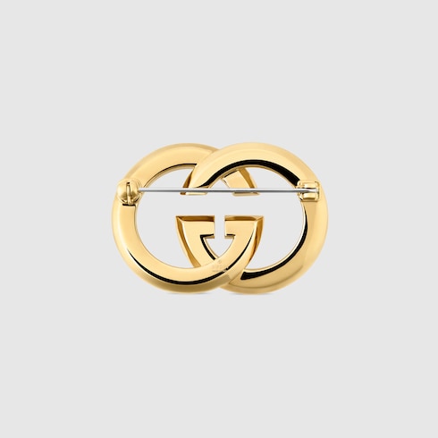 เข็มกลัด Gucci Interlocking brooch with crystals