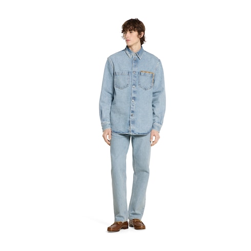 Pantalone in denim délavé con inserto GG