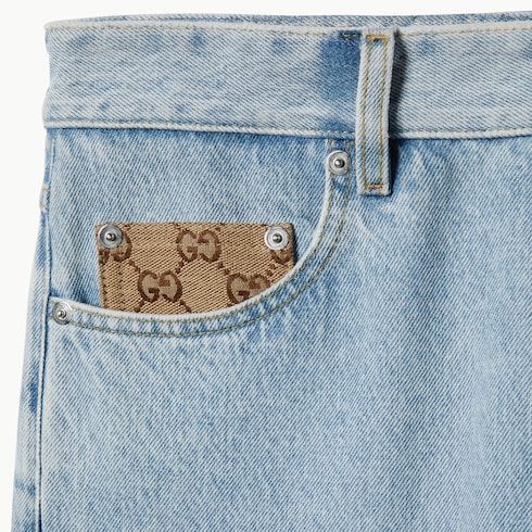 Pantalone in denim délavé con inserto GG