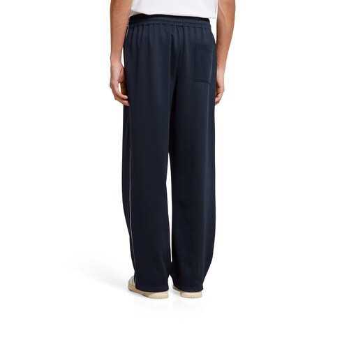 Pantalon en jersey technique avec logo en relief