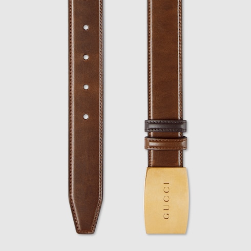 Reversible belt with plaque buckle