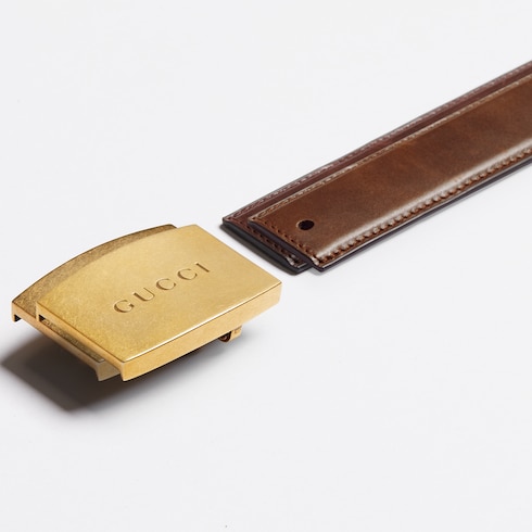Reversible belt with plaque buckle
