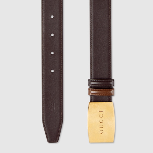 Reversible belt with plaque buckle