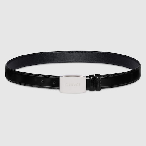 Reversible belt with plaque buckle