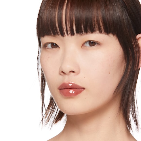 구찌 글로스 아 레브르 플럼핑 스무딩&모이스쳐라이징 립글로스 수잔 브라운 118