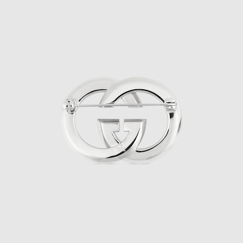 Interlocking G brooch with crystals