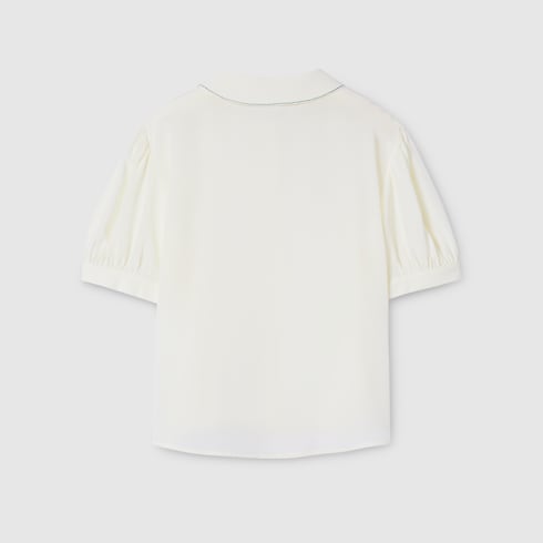 Kinderbluse aus Seide mit Stickerei