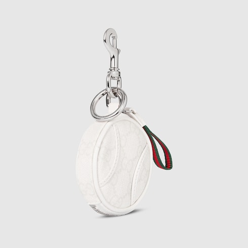 محفظة نقود معدنية على شكل كرة تنس