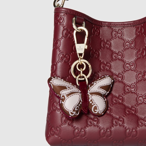 Borsa a secchiello GG Emblem misura piccola