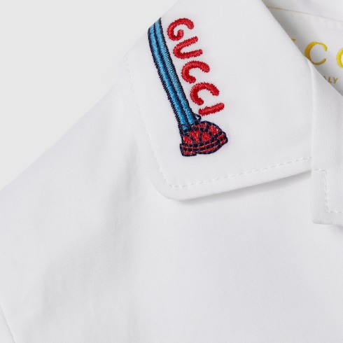 لباس مؤلف من قطعة واحدة من القطن المخطط للأطفال الرضّع