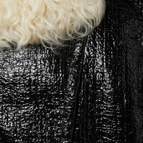 Chaqueta bomber de tejido revestido