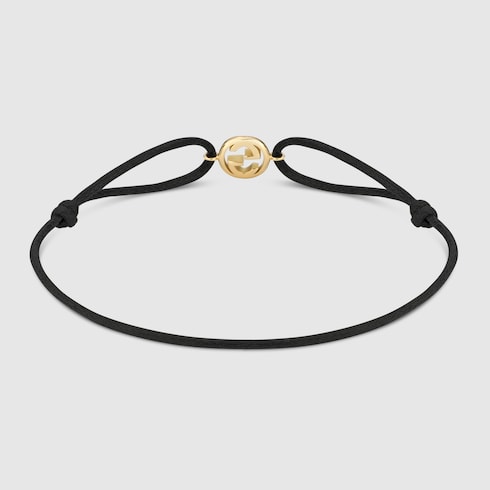 Bracciale Gucci Interlocking con ciondolo 18 carati