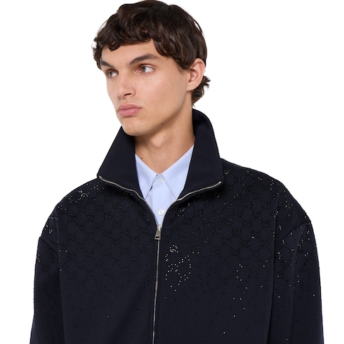 Chaqueta con zipper de punto técnico con cristales