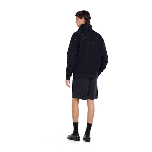 Chaqueta con zipper de punto técnico con cristales