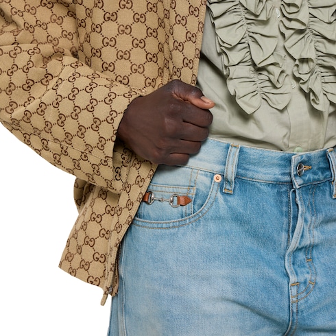 Flared bleached cotton denim trousers