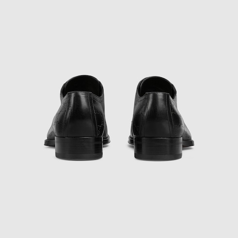 Scarpa stringata uomo con motivo GG laserato