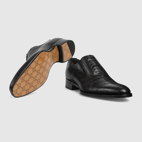 Men's lace-up shoe with lasered GG