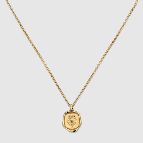 Gucci crest pendant necklace