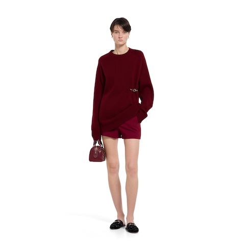 Jersey de lana y cashmere con broche