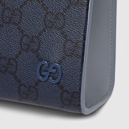 Cartera de mano ribete azul empolvado mediana
