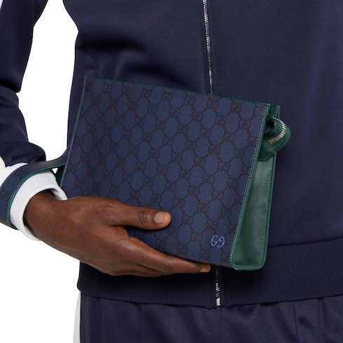 Mittelgroße Pouch mit grünem Besatz