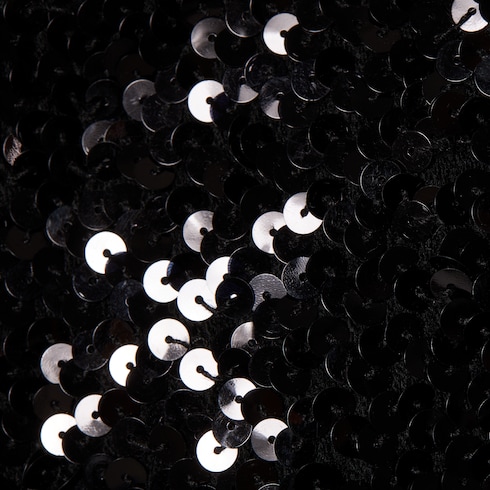 Combinaison en tissu élastique avec sequins brodés