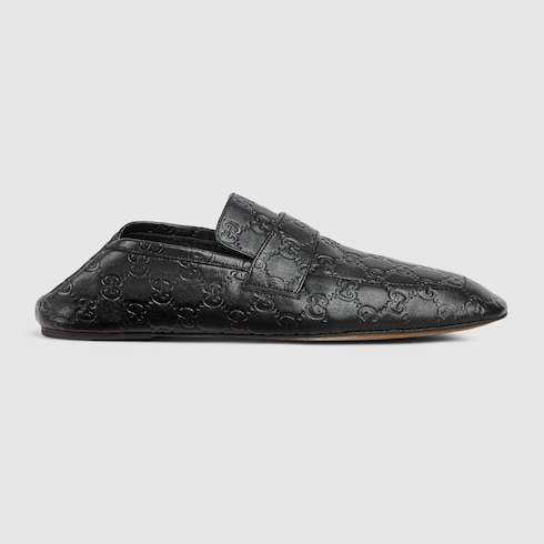 Men's loafer with embossed GG