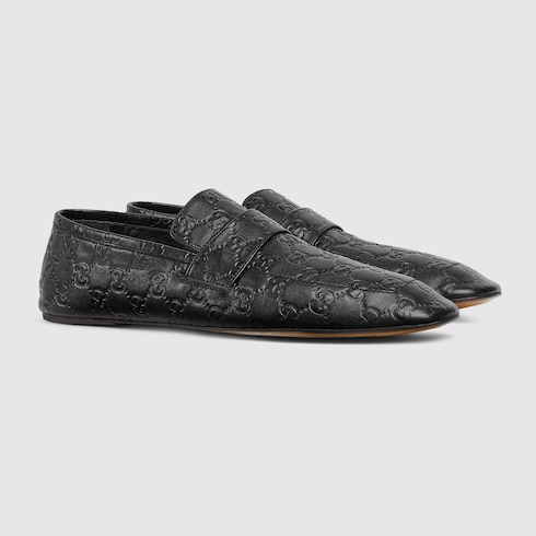 Men's loafer with embossed GG