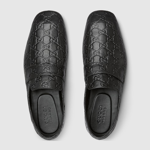 Men's loafer with embossed GG