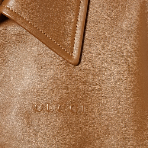 Veste en cuir avec logo Gucci