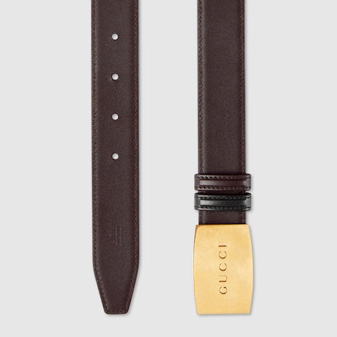 Reversible belt with plaque buckle