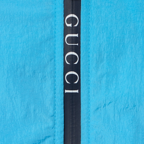 Baby nylon froissé jacket in light blue | GUCCI® INT