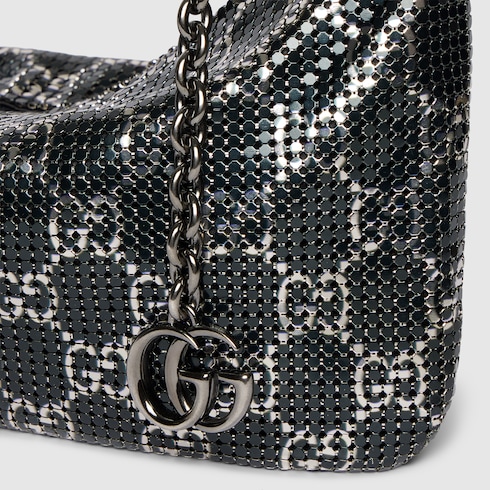 Metallic evening bag with charm