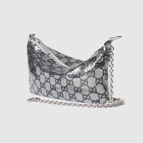 Metallic evening bag with charm