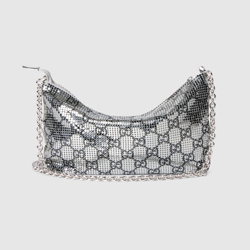 Metallic evening bag with charm