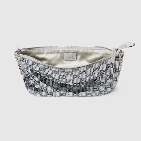 Metallic evening bag with charm