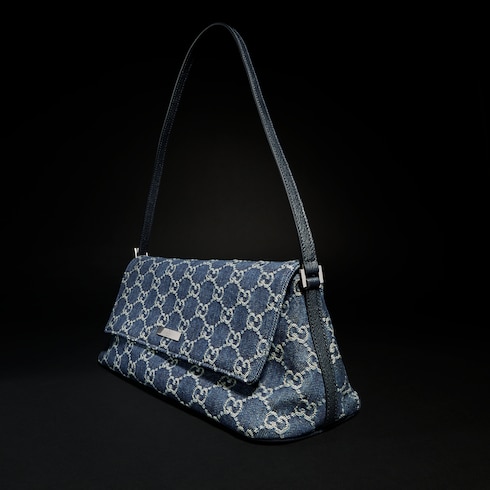 Medium shoulder bag with Gucci plaque