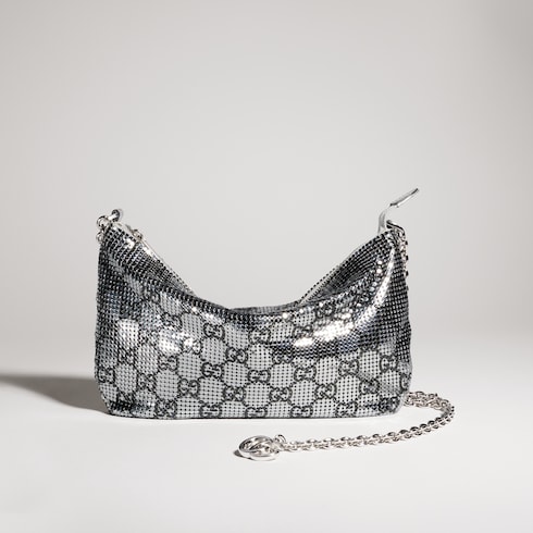 Bolsa de noche metálica con dije